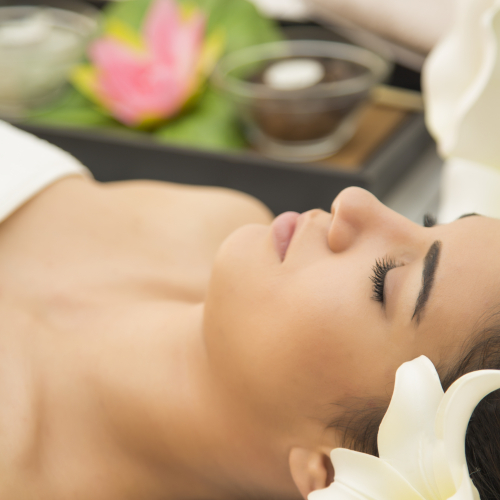 woman relaxing in massage spa waiting for facial